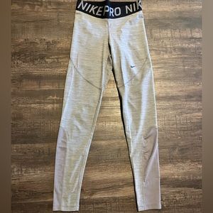 Women’s Nike Pro Gray Heather leggings. Size Medium